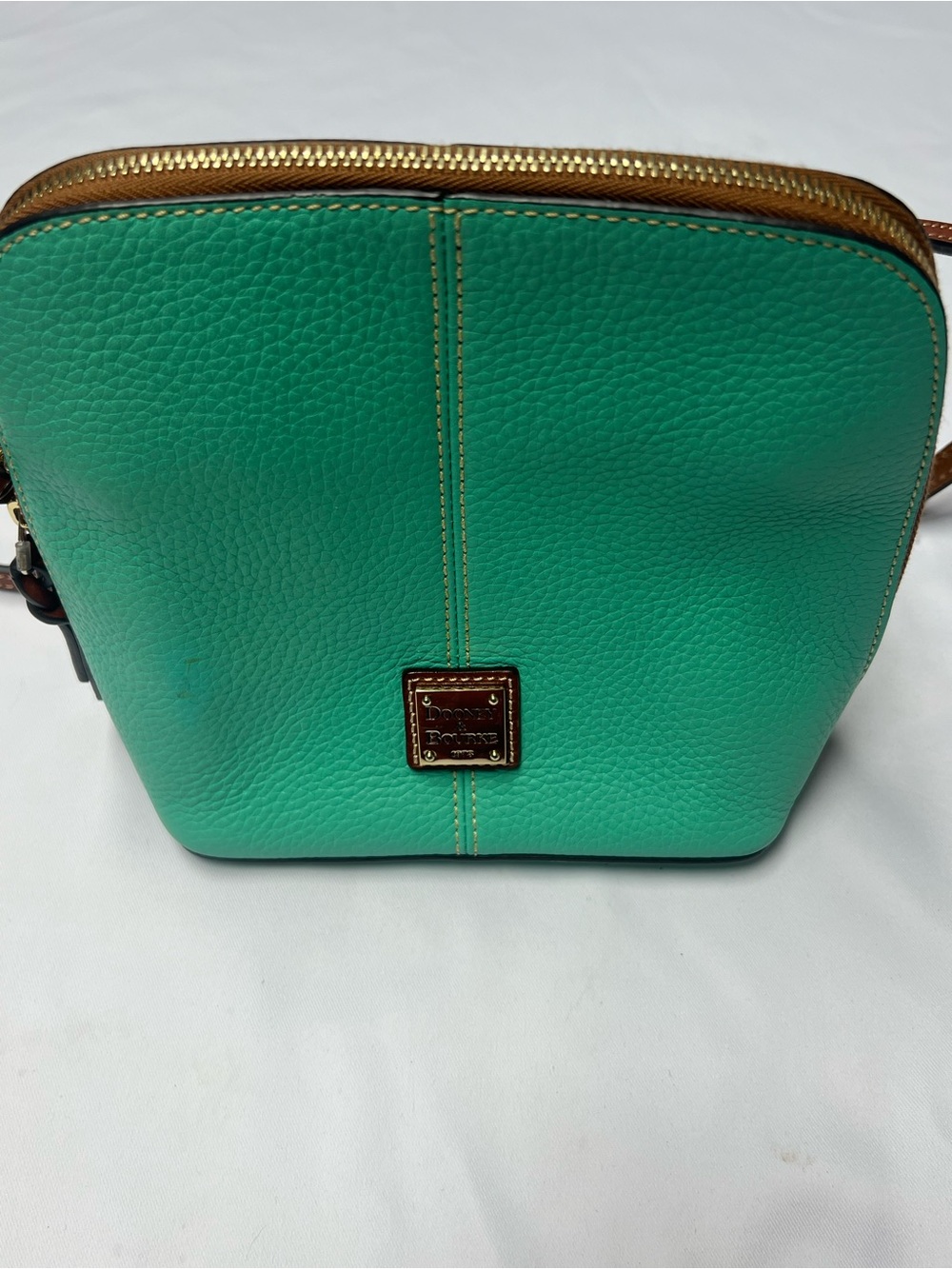 Dooney & Bourke Trixie crossbody bag featuring textured pebble grain leather